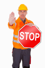 Man Showing Stop Sign