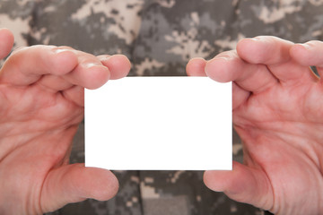 Mature Soldier Holding Blank Paper