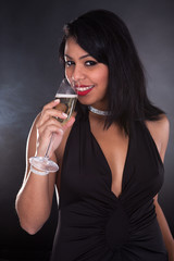 Woman Holding Glass Of Champagne