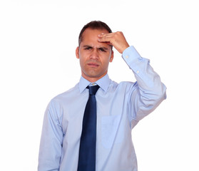 Adult man with headache holding his forehead