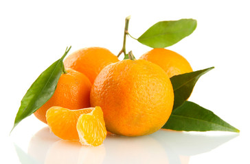 Ripe sweet tangerine with leaves, isolated on white