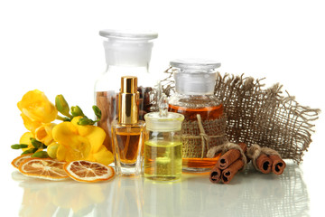 Bottles with ingredients for the perfume, isolated on white