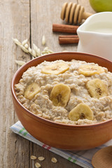 bowl of oatmeal on wood