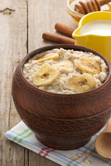 bowl of oatmeal on wood