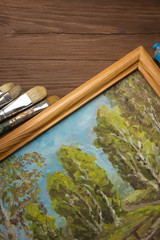 Fototapeta na wymiar brush and painting on wood