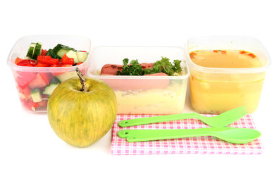 Tasty lunch in plastic containers, isolated on white