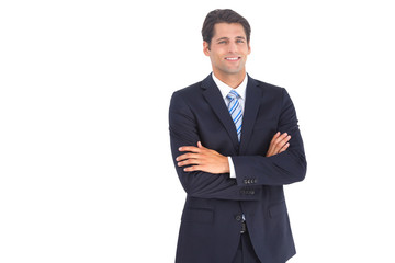 Stylish businessman with crossed arms