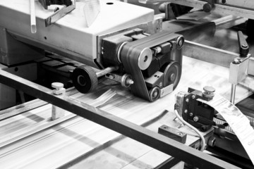 Close up printing machine during production