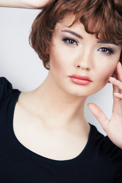 Woman face close up beauty portrait. Female model poses