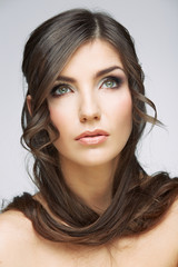 Fototapeta premium Woman face close up beauty portrait. Girl with long hair lookin