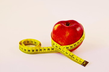 Apple and measuring tape