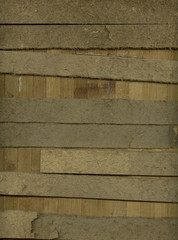 fragment of old wooden and cartoon construction