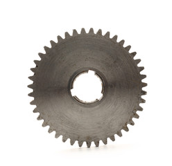 Steel cogwheel on white background