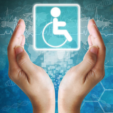 Disabled icon in hand,medical background