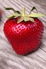 Fresh strawberries on wooden table