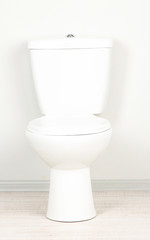 White toilet bowl in a bathroom