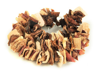 Dried mushrooms on string isolated on white