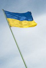 Flag of Ukraine against the blue sky