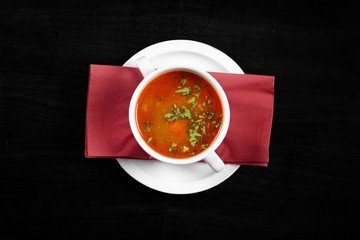 Delicious soup in white dish