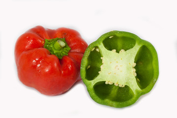 Red and green sweet peppers, isolated on white background