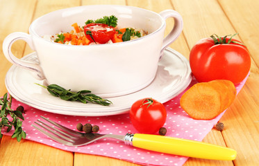 Delicious rice with vegetables and herbs in pot