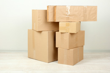 Different cardboard boxes in room