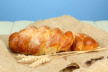 Composition with buns in wicker basket,