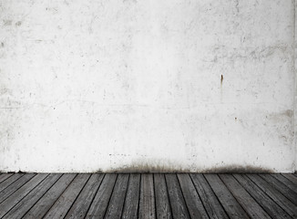 white wall and black wood floor