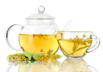 Kettle and cup of tea with linden