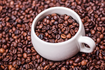 Cup with coffee beans