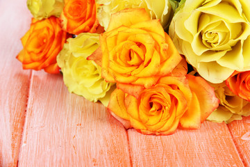 Beautiful bouquet of roses on table close-up