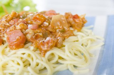 spaghetti with tomato pork sauce and sausage