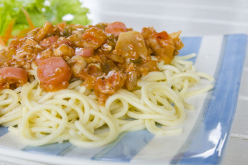 spaghetti with tomato pork sauce and sausage
