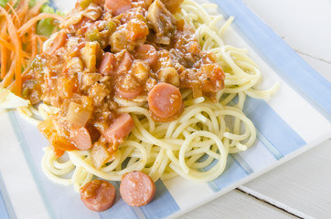 spaghetti with tomato pork sauce and sausage