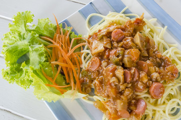 spaghetti with tomato pork sauce and sausage
