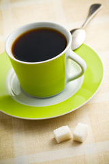 black coffee in green cup