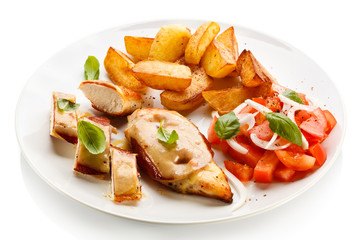 Grilled chicken breasts with cheese and baked potatoes