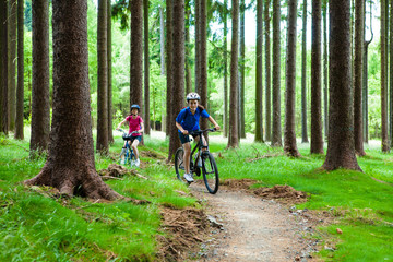 Naklejka premium Two women riding bikes
