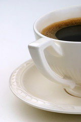 details of the cup of coffee with a tray