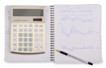 notebook with calculator and pen