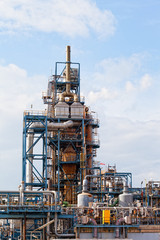 Fototapeta na wymiar View of big oil refinery of a sky background