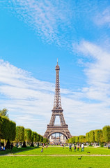 Eiffel Tower against the blue sky and clouds. Paris. France.