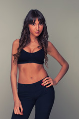 Naklejka premium Beautiful healthy fitness woman posing
