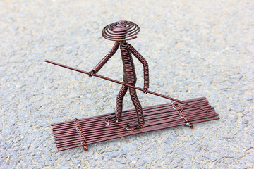 toy crafts boatman made of copper wire