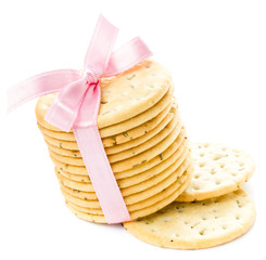Cookies with red ribbon isolated on white background, closeup