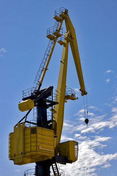 sky clouds and yellow crane in   argentina