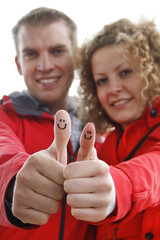 Thumbs up with smiley
