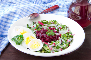 Traditional cold Lithuanian summery soup made of beets, cucumber