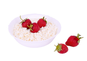 The plate with cottage cheese and strawberries white
