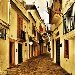 street of Dalt Vila, the old town of Ibiza Town, in Balearic Isl © nito
